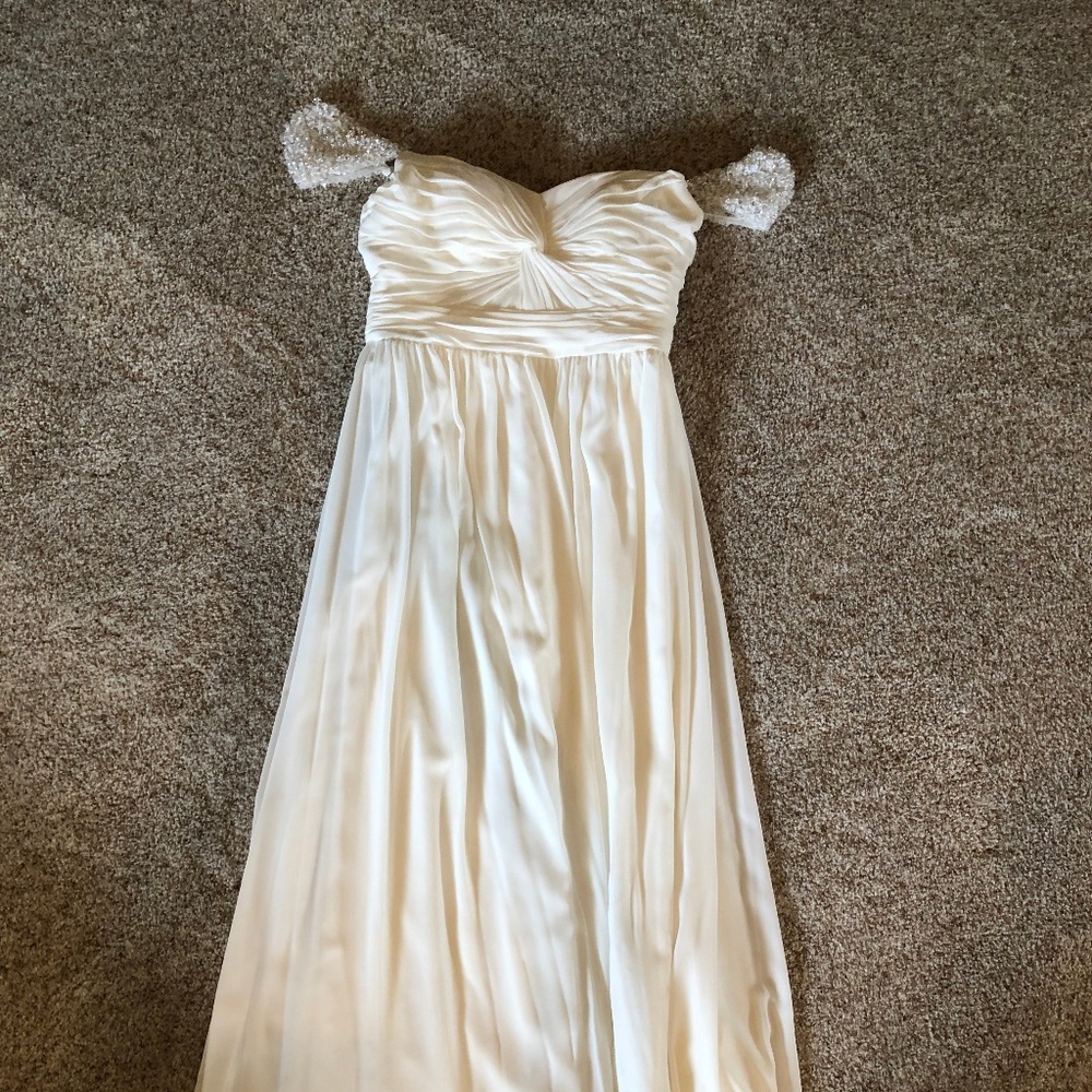 Beaded-sleeved gown